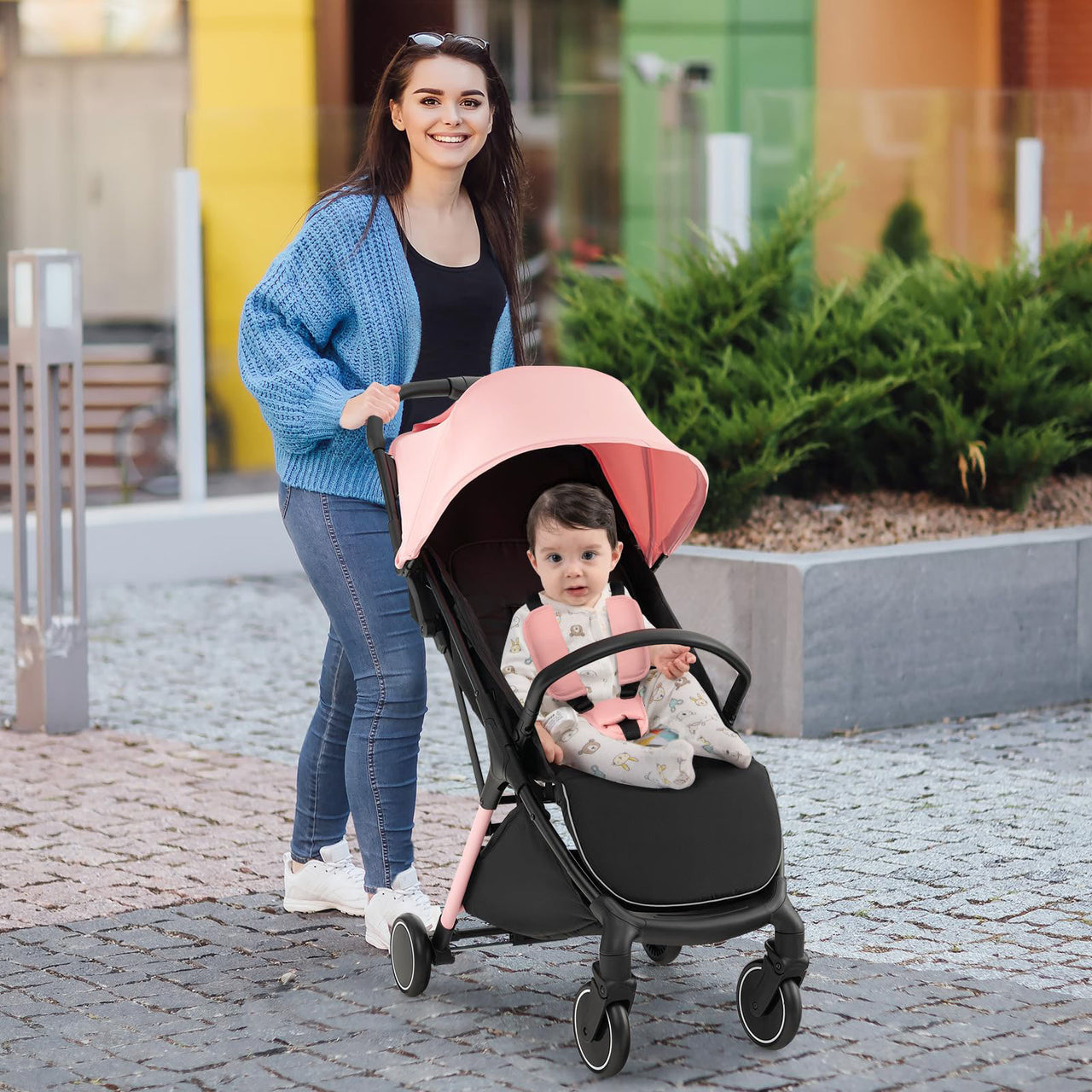 BABY STROLLER WITH ADJUSTABLE CANOPY AND FOOTREST